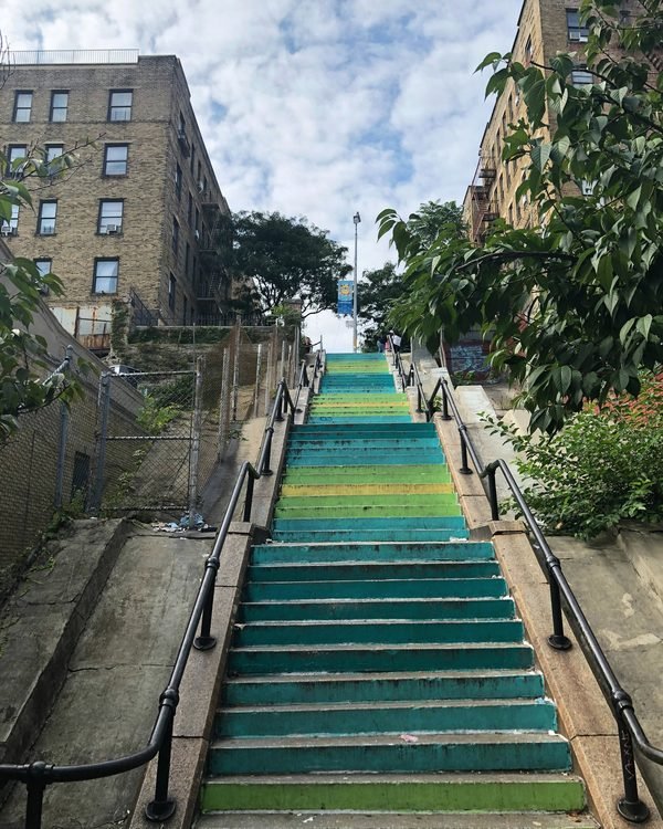 A painted step street between apartment buildings in the northwest Bronx